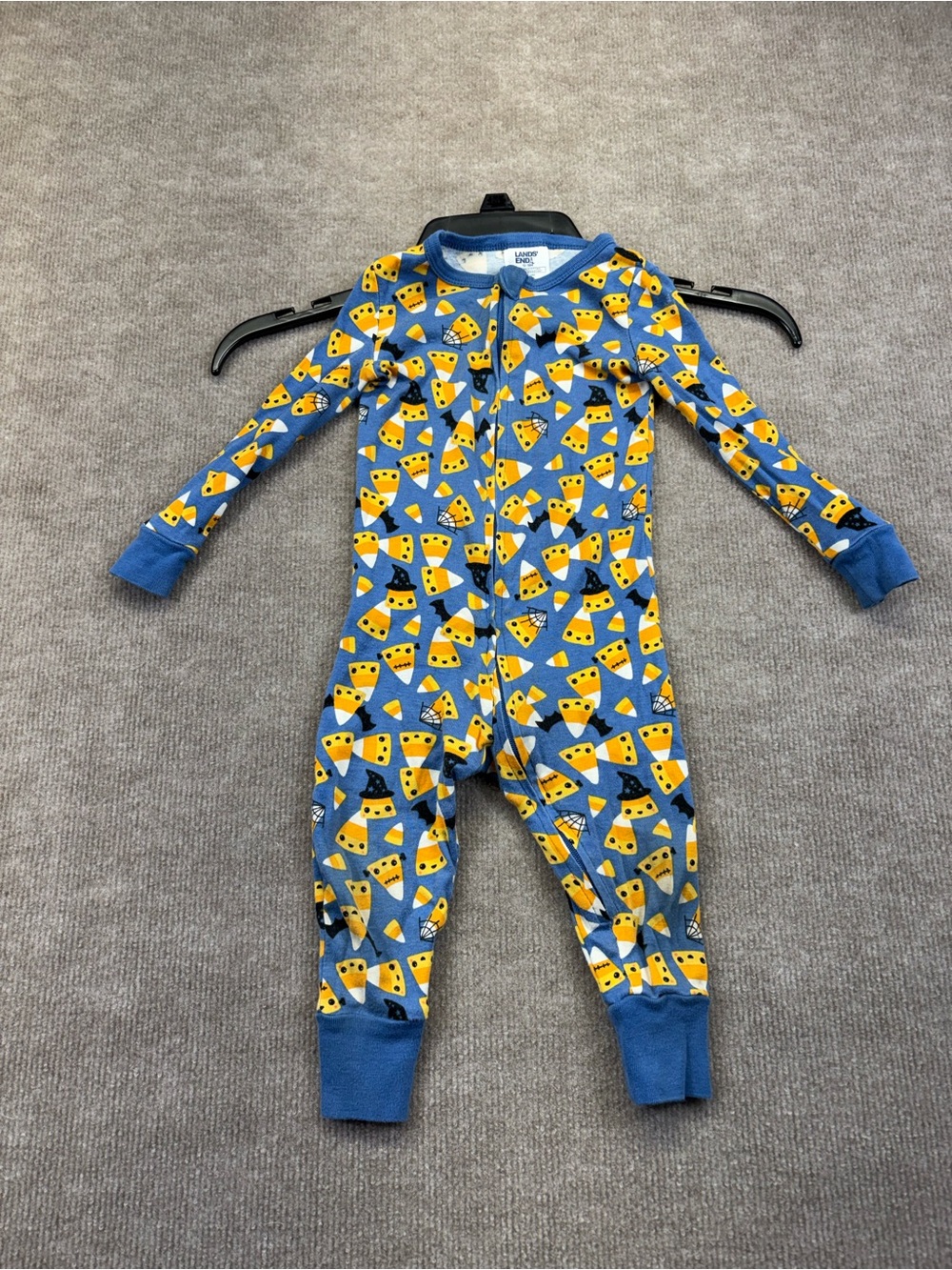 Lands' End infant zip-up sleeper with a playful Halloween candy corn and witch h